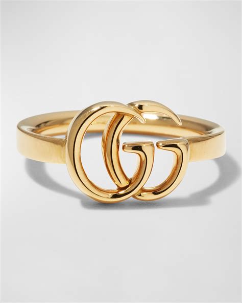 Gg running 18k ring with diamonds .